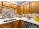 Stylish kitchen featuring stainless steel appliances, quartz countertops, and modern fixtures at 1990 Wellbourne Dr # 5, Atlanta, GA 30324