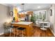 Bright eat-in kitchen featuring a breakfast bar, stainless steel appliances, and modern lighting at 1990 Wellbourne Dr # 5, Atlanta, GA 30324