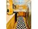 Galley kitchen featuring modern appliances, updated cabinetry, and a sleek design at 1990 Wellbourne Dr # 5, Atlanta, GA 30324