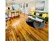 Inviting living room featuring hardwood floors, a stylish rug, and comfortable seating arrangement at 1990 Wellbourne Dr # 5, Atlanta, GA 30324