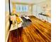 Cozy living room boasts hardwood floors, a comfortable couch, and a stylish area rug at 1990 Wellbourne Dr # 5, Atlanta, GA 30324