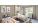 Inviting bedroom with twin beds, playful decor, and plenty of natural light at 3275 Dodson Dr, East Point, GA 30344