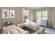 Inviting bedroom featuring twin beds, ample natural light, and stylish decor at 3275 Dodson Dr, East Point, GA 30344