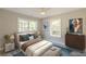 Comfortable bedroom featuring natural light, neutral decor, and stylish furnishings at 3275 Dodson Dr, East Point, GA 30344