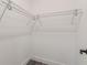Empty walk-in closet with wire shelving, ready for organization and storage at 3275 Dodson Dr, East Point, GA 30344