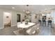 Open-concept living space connects to the kitchen with modern dining area at 3275 Dodson Dr, East Point, GA 30344