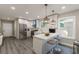 Modern kitchen with stainless steel appliances and a marble countertop island at 3275 Dodson Dr, East Point, GA 30344