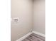 Bright laundry room features modern flooring and convenient hookups at 3275 Dodson Dr, East Point, GA 30344