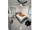 Bright bedroom featuring modern ceiling fan, updated decor, and plentiful natural light at 3593 Adkins Nw Rd, Atlanta, GA 30331