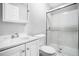 Bathroom with a glass-doored shower, white subway tiles and a modern vanity at 3650 Croft Nw Pl, Atlanta, GA 30331
