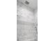 Elegant bathroom shower featuring luxurious marble tiling and a modern shower head fixture at 5211 Powers Ferry Rd, Sandy Springs, GA 30327