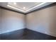 Bedroom boasts dark hardwood floors, recessed lighting, and elegant trim work at 5211 Powers Ferry Rd, Sandy Springs, GA 30327