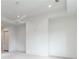 Bright, airy bedroom with neutral walls, carpet, and recessed lighting at 5211 Powers Ferry Rd, Sandy Springs, GA 30327