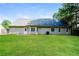 Expansive backyard showcasing well-maintained lawn, perfect for outdoor activities and gatherings at 85 Chestnut Dr, Covington, GA 30016