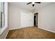 Bedroom with carpet, double closet, neutral walls, and a window at 85 Chestnut Dr, Covington, GA 30016