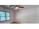 Bedroom featuring hardwood flooring, a modern ceiling fan, and windows allowing plenty of light at 2000 Brickton Sta, Buford, GA 30518