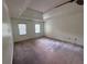 Spacious bedroom with vaulted ceiling and lots of natural light from the windows at 2000 Brickton Sta, Buford, GA 30518