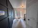 Welcoming entryway featuring stylish wall paneling, tiled floor, and modern lighting at 2000 Brickton Sta, Buford, GA 30518
