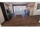 Modern kitchen with stainless steel refrigerator, island and open to dining area at 2000 Brickton Sta, Buford, GA 30518