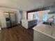 Well-designed kitchen with island and stainless steel appliances, plenty of counter space and storage at 2000 Brickton Sta, Buford, GA 30518