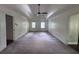 Large primary bedroom featuring a ceiling fan, tray ceilings and lots of space at 2000 Brickton Sta, Buford, GA 30518