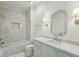 Classic bathroom featuring a tub and shower combination and vanity with storage at 3379 Rennes Ne Dr, Brookhaven, GA 30319