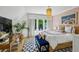 Bright bedroom features a bed, desk and chair and patterned wallpaper at 3379 Rennes Ne Dr, Brookhaven, GA 30319