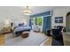 Charming bedroom featuring a window with blue curtains and airplane decor at 3379 Rennes Ne Dr, Brookhaven, GA 30319