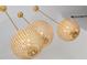 Close up of a gold crystal chandelier, featuring globe shaped lights at 3379 Rennes Ne Dr, Brookhaven, GA 30319