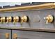 Close up of a La Cornue range with brass accents and knobs at 3379 Rennes Ne Dr, Brookhaven, GA 30319