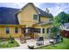 Relaxing backyard patio with seating, outdoor grill and landscaped yard. Includes access to the home at 452 Emerald Trce, Jonesboro, GA 30236