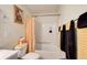 Cozy bathroom featuring a tub and shower, as well as a peach shower curtain at 452 Emerald Trce, Jonesboro, GA 30236