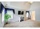 Bright living room with vaulted ceilings and natural light from large windows at 452 Emerald Trce, Jonesboro, GA 30236