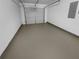 Empty garage with sealed concrete floor at 4817 Enclave Dr, Union City, GA 30291