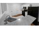 Beautiful kitchen featuring granite countertops, a sink, and modern appliances at 4817 Enclave Dr, Union City, GA 30291