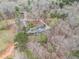 Overhead shot of the house and driveway on wooded lot at 4150 E Chapel Hill Rd, Douglasville, GA 30135