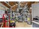 Unfinished basement providing ample storage space with visible utilities and concrete flooring at 4150 E Chapel Hill Rd, Douglasville, GA 30135