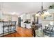 Charming eat-in kitchen featuring a breakfast bar, pendant lighting and stainless steel appliances at 4150 E Chapel Hill Rd, Douglasville, GA 30135