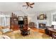 Inviting living room with hardwood floors, fireplace and well-appointed furnishings, creating a cozy and stylish atmosphere at 4150 E Chapel Hill Rd, Douglasville, GA 30135