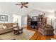 Comfortable living room with hardwood floors, ceiling fan and well-appointed furnishings, creating a cozy space at 4150 E Chapel Hill Rd, Douglasville, GA 30135
