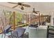 Relaxing covered patio with outdoor seating and ceiling fans, offering a serene outdoor space at 4150 E Chapel Hill Rd, Douglasville, GA 30135