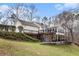 Two-story home with a deck and covered patio at 4150 E Chapel Hill Rd, Douglasville, GA 30135