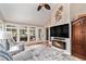 Bright sunroom with fireplace, large windows and vaulted ceiling at 4150 E Chapel Hill Rd, Douglasville, GA 30135