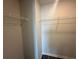 Walk-in closet with shelving for storage at 8664 Webb Rd, Riverdale, GA 30274