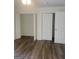 Bedroom with new floors, featuring double closets, and modern finishes for added space at 103 Tiburon Ct, Stonecrest, GA 30038