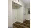 View of the laundry room featuring new wood-look flooring at 103 Tiburon Ct, Stonecrest, GA 30038