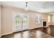 Dining Room featuring doors to the yard and views of the fireplace at 1070 Evergreen Oak Way, Dacula, GA 30019