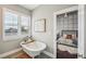 Clawfoot tub situated next to a bright window and open doorway into the bedroom at 206 Ne 11Th Ne St # 703A, Atlanta, GA 30309