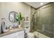 Stylish bathroom with a glass-enclosed shower, modern fixtures, and decorative touches at 206 Ne 11Th Ne St # 703A, Atlanta, GA 30309