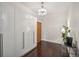 Closet with hardwood floors and modern light fixture at 206 Ne 11Th Ne St # 703A, Atlanta, GA 30309